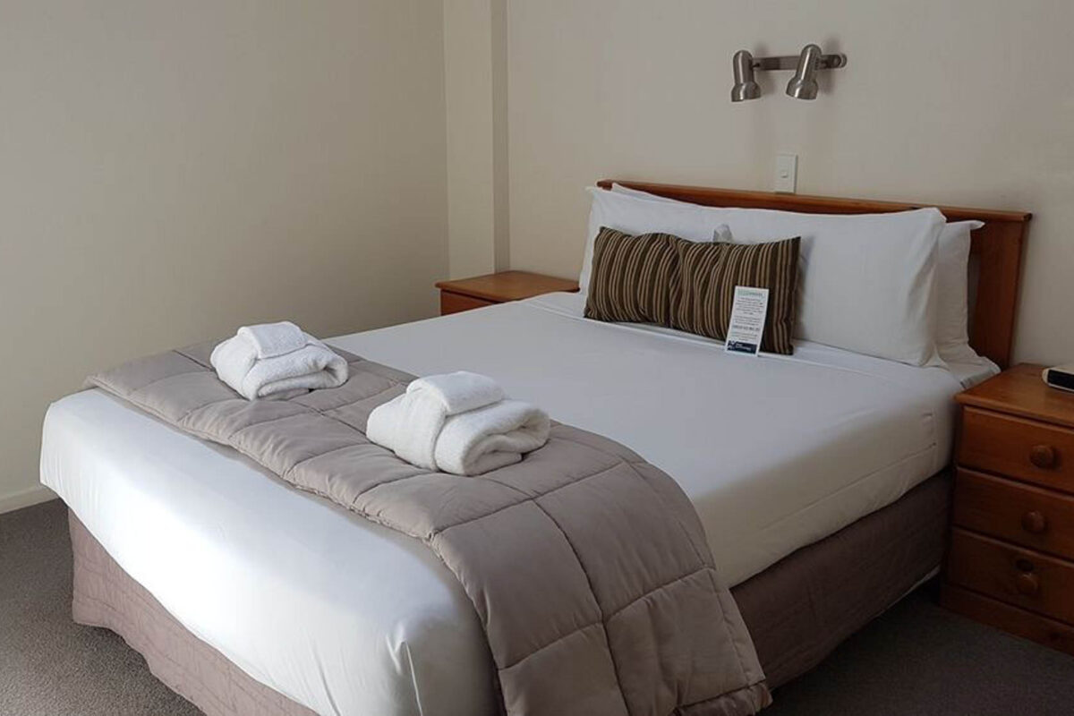 Bed - Courtenay Village 2 Bedroom Apartment Bed - Courtenay Village 2 Bedroom Apartment