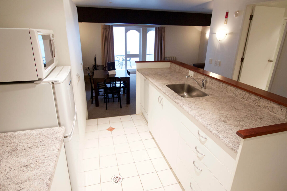 Kitchen + Lounge - Willis Village 2 Bedroom Apartment Kitchen + Lounge - Willis Village 2 Bedroom Apartment