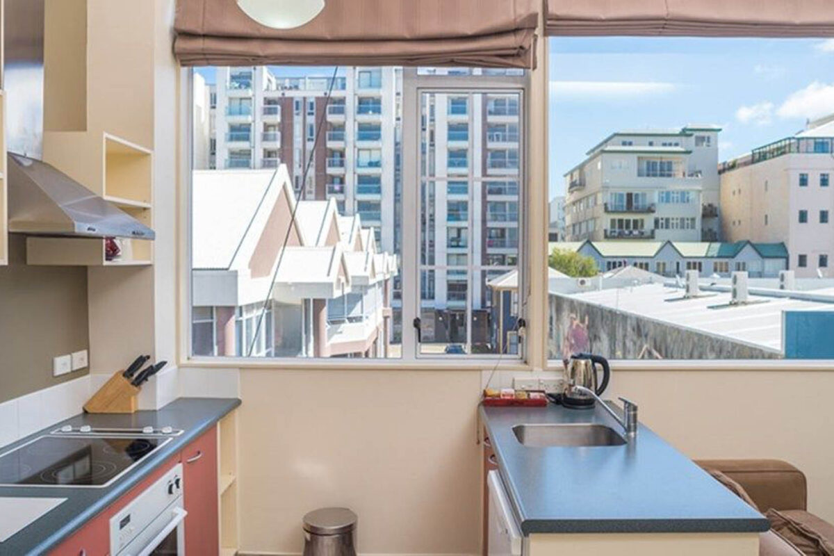 Kitchen + View - Courtenay Village 2 Bedroom Apartment Kitchen + View - Courtenay Village 2 Bedroom Apartment