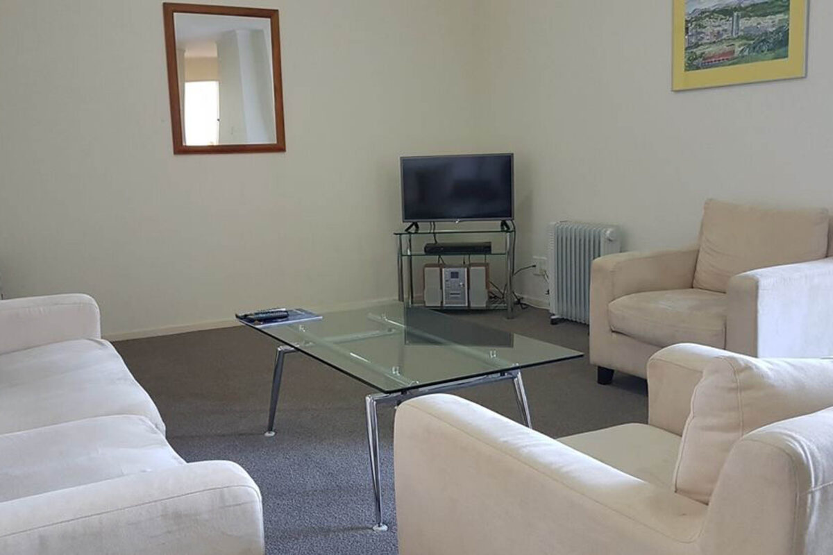 Living Room - Courtenay Village Two Bedroom Apartment Living Room - Courtenay Village Two Bedroom Apartment
